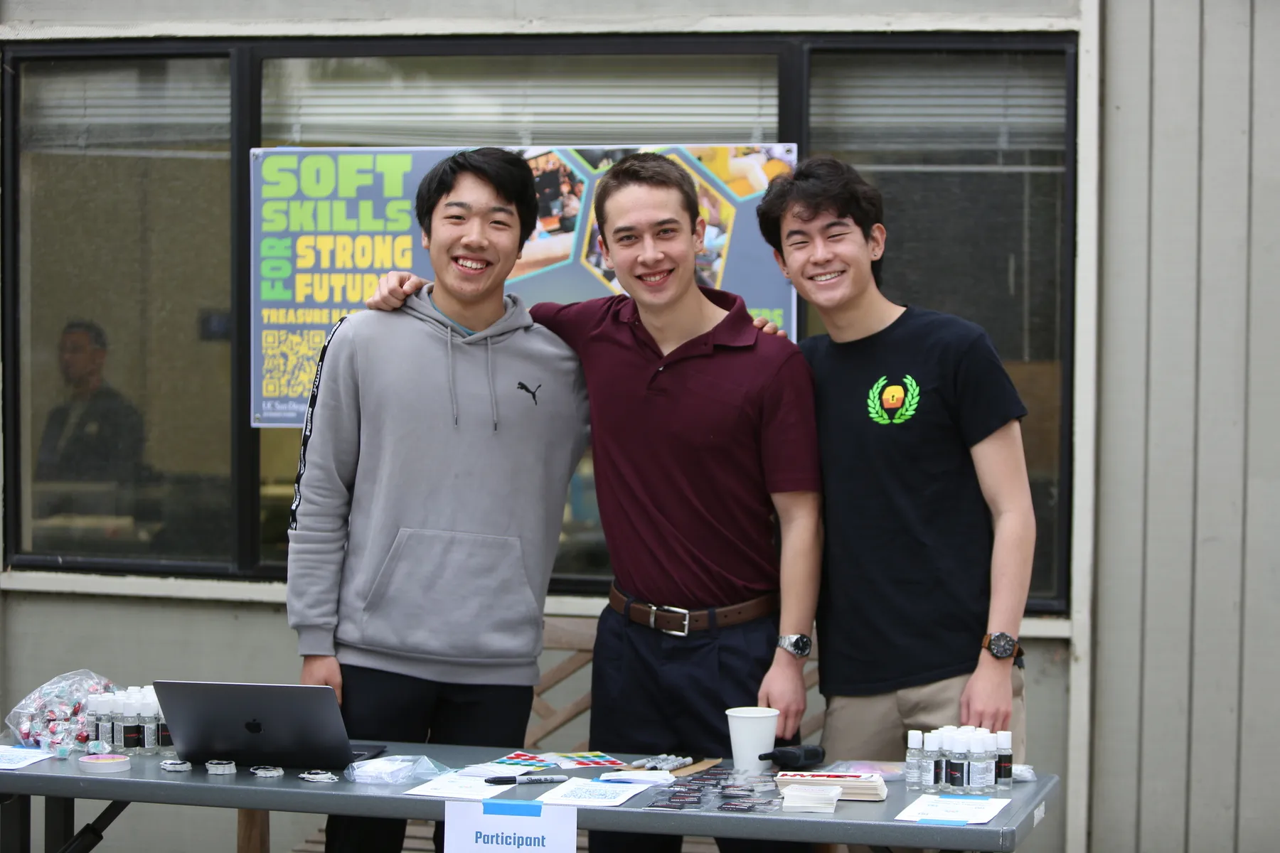 Ethan Xie, Ethan Kosaki, and Brandon Joe at the beginning of the event